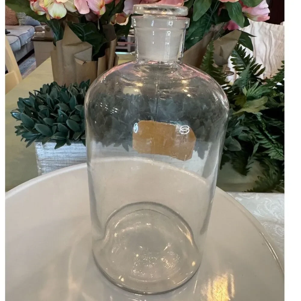 Vintage glass apothecary bottle, pharmacy bottle with stopper